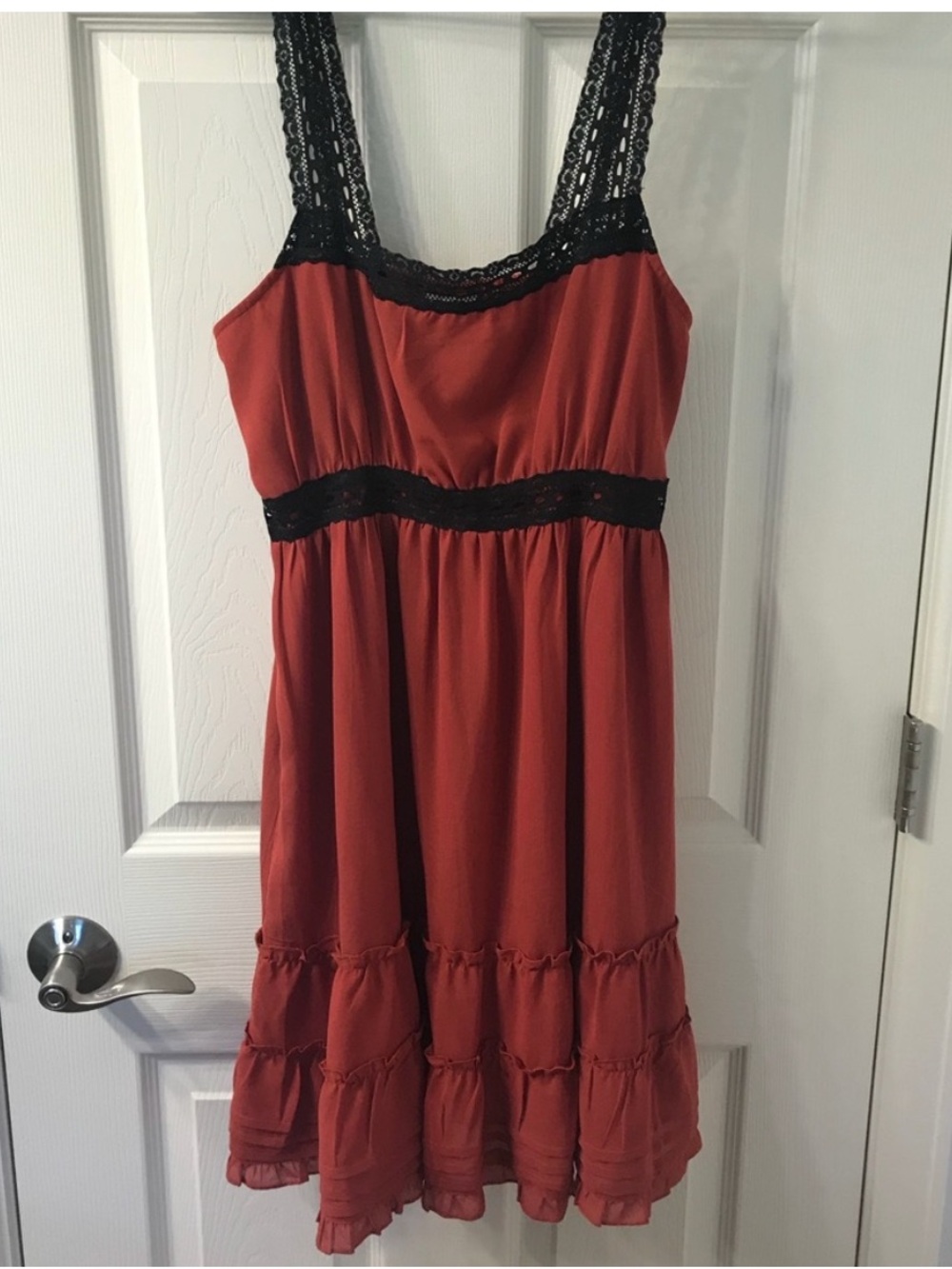 Burnt orange Daytrip dress with black lace trim